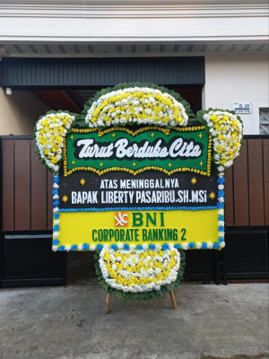 Papan Bunga Duka di Sario Tumpaan