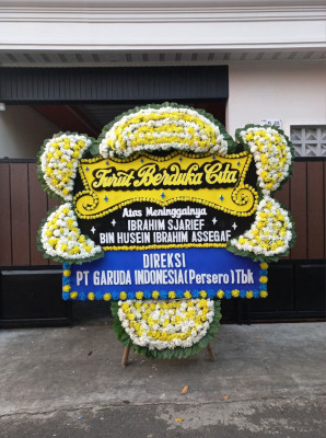 Papan Bunga Duka di Sario Tumpaan