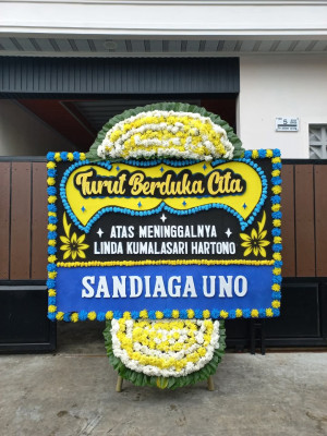 Papan Bunga Duka di Sario Tumpaan